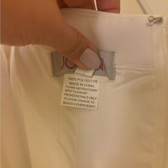 Jovani size 8 Strapless white gown with slit, side bow, and small tail. - Picture 9 of 10